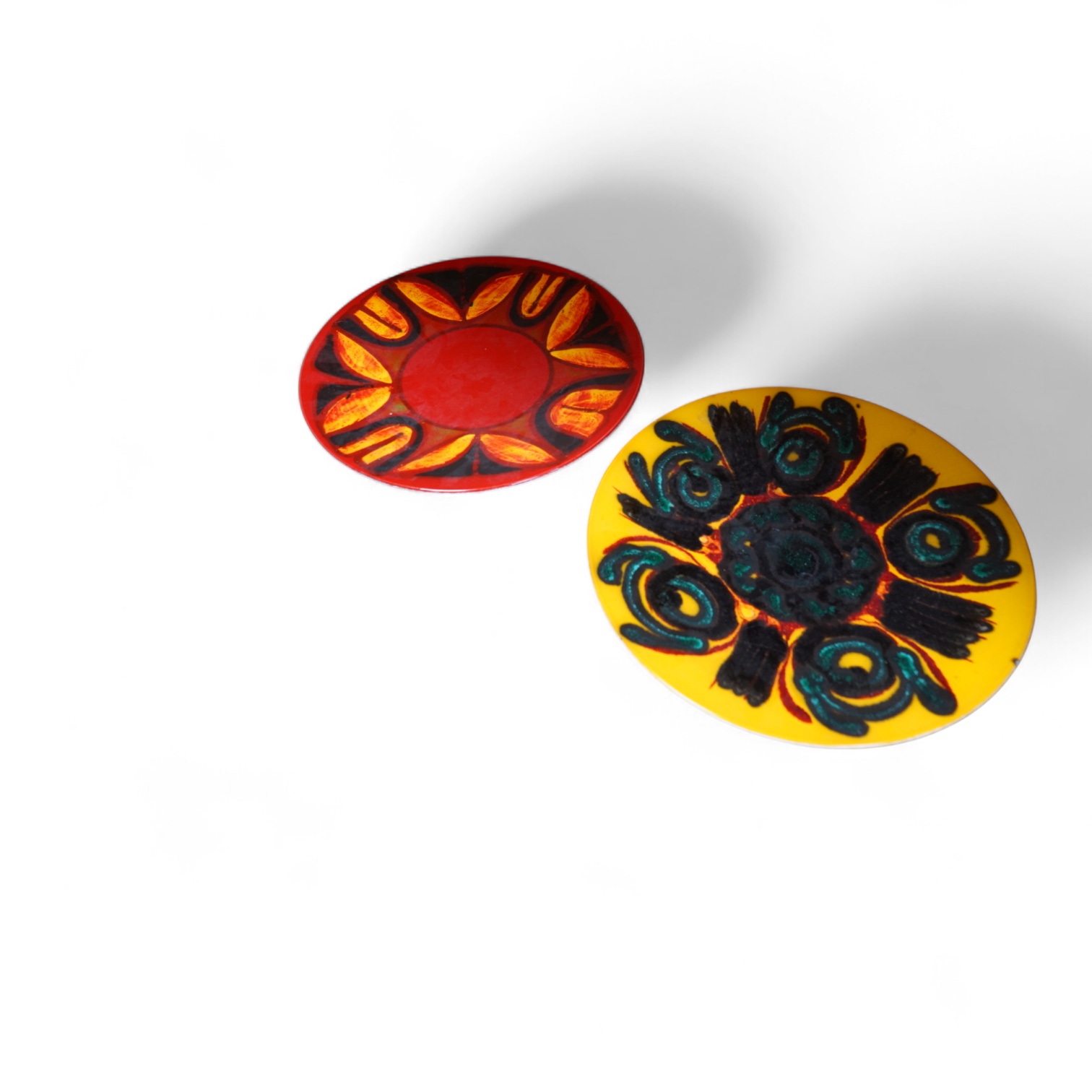 Two mid century Poole pottery Delphis chargers, 36cm in diameter